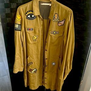 Green decorated dress by Chelsea & Violet